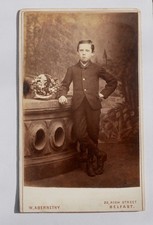 CDV OF SMART BOY, STUDIO PROPS, PAINTED BACKDROP, BY ABERNETHY OF BELFAST