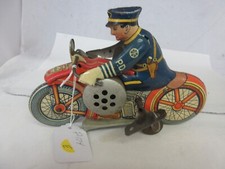 VINTAGE  MARX TIN WIND UP MOTORCYCLE COP    CHILDS TOY  P-174