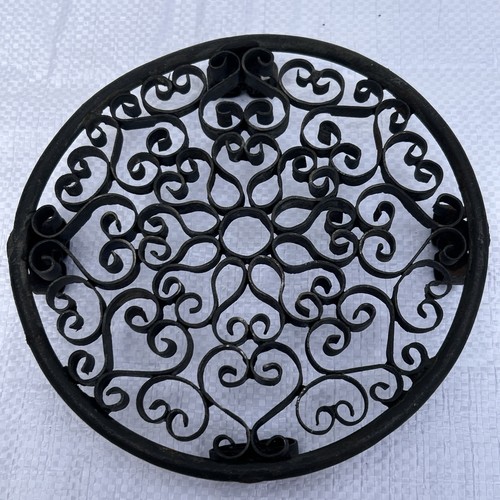 Trivet cast iron vintage - trivet,