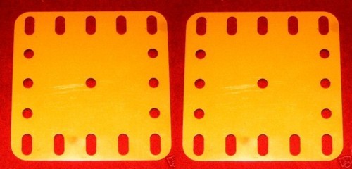 Two meccano yellow - yellow, plastic