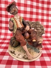 Capodimonte Drunken Male Tramp Sat On A Bench With Cup In Hand Figurine 10.5”