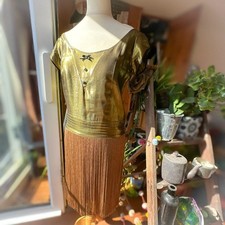 TBA To Be Adored Gold Fringe