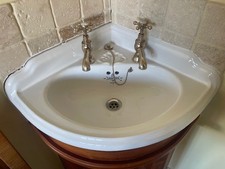 Sanitan Corner Basin Sink complete with brass look taps, fittings, cupboard unit