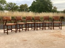 A FINE SET OF 6 ANTIQUE LEATHER & OAK JACOBEAN STYLE DINING CHAIRS