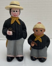 2 x Clay Terracotta Pottery Men Figures - Black Jumpers, Yellow Neckties & Pipes