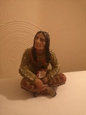 Native American Sitting Statue