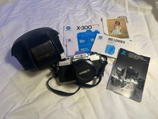 Minolta X-300 35mm SLR Film Camera with 50mm Lens, Case, Paperwork and Filters
