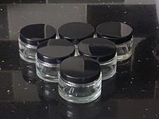 6 small glass jars with