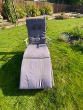 Outsunny brand sun lounger with cushion and waterproof cover
