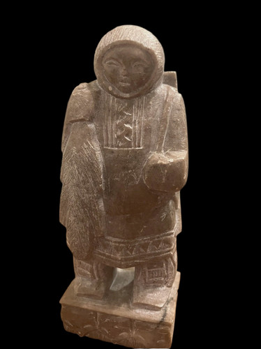 Inuit hunter with - &, furs