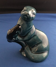Vintage Poole Pottery Otter holding a Salmon