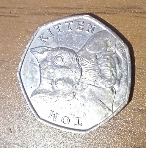 British 50p coin tom - uk,