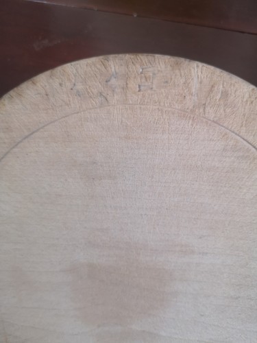 Antique carved breadboard