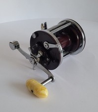 Penn Multiplier Sea Fishing Reel Jigmaster 500 Trolling Boat Beach Pier Burgundy