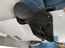 Passier dressage saddle, black deep 17 inches seat, used but in good condition.