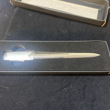 Chrome-finished metal letter