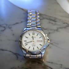 Seiko kenetic titanum sq100