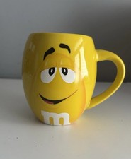 M & M’s World Yellow M & M Mug “Completely Nuts”  Mug 2014. Used with Marks
