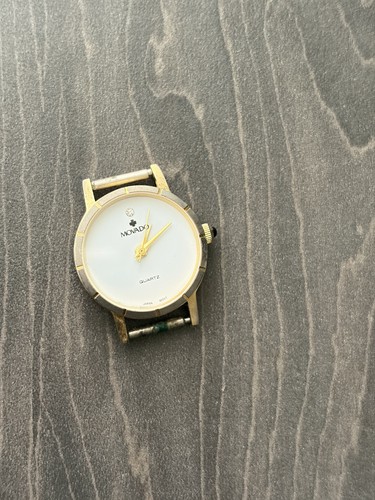 Movado watch face - movado, gold