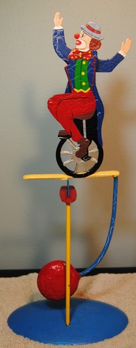 Vintage clown unicycle - on,