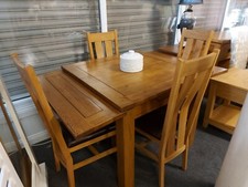 oak furniture land extending  dining table and chairs 