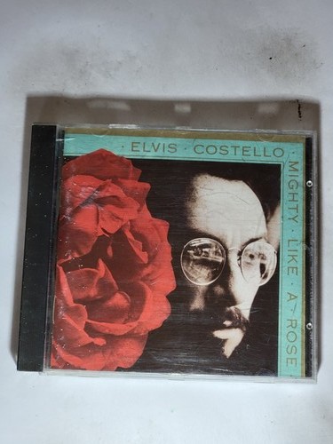 Elvis costello mighty like a - costello,