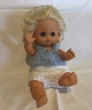 Vintage 60s 11” plastic Blue eyed Doll. Moving limbs, head & eyes. Blond. Knit