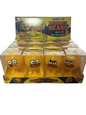 Light-Up Wobble Head Toys –