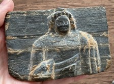 ANCIENT GANDHARA. CARVED STONE BUDDHA FIGURE. DATING TO 3RD-4TH CENTURY A.D.