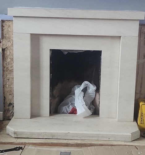 White stone fireplace surround - white,