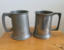 Antique pewter tankards x 2