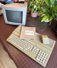 Atari ST Computer. Includes Mouse, Manual and Orignal CRT Monitor