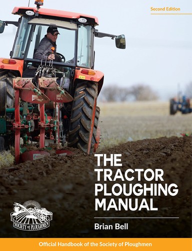 The tractor ploughing - the,
