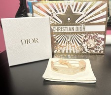 (Open to offers)Christian Dior Cotton Bracelet In Pink with Gold Bee Detail