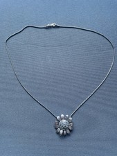 PIA SILVER FLOWER PENDANT NECKLACE