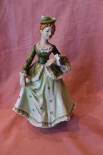 Merry Widow in green dress