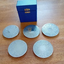 Vintage silver plated coasters