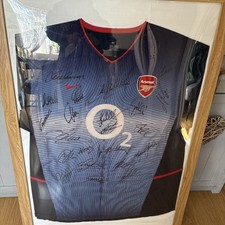  2003/4 Arsenal Invincibles Squad Signed Shirt. Rare 3rd Blue shirt. 