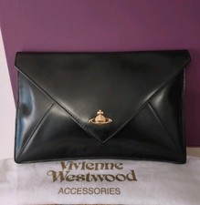 VIVIENNE WESTWOOD SMALL  BLACK LEATHER  CLUTCH BAG GOOD CONDITION.?....