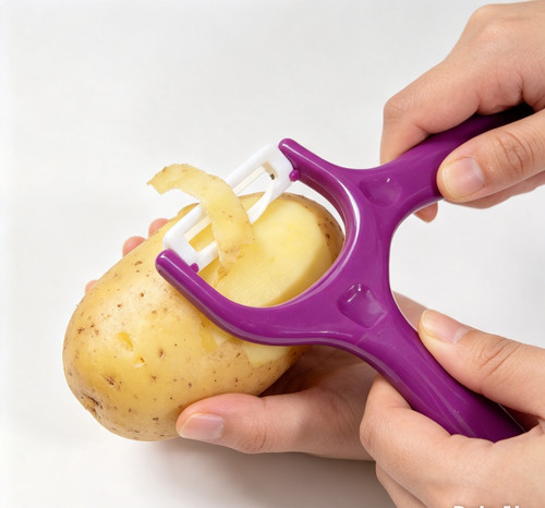 Vegetable peeler shaped - vegetable, y