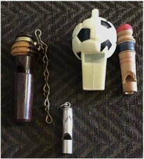GROUP OF 4 X VINTAGE WHISTLES.TWO WOODEN,ONE PLASTIC,ONE METAL.VGC