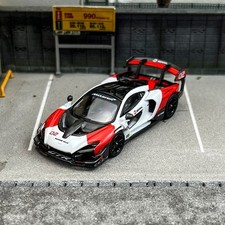 CM 1:64 White Red Senna GTR
