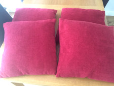 Next set of four square red cushions with filling