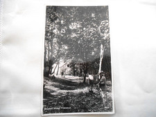 BLUEBELL WOOD PRESTATYN RP POSTCARD ARTIST PAINTING IN FOREGROUND