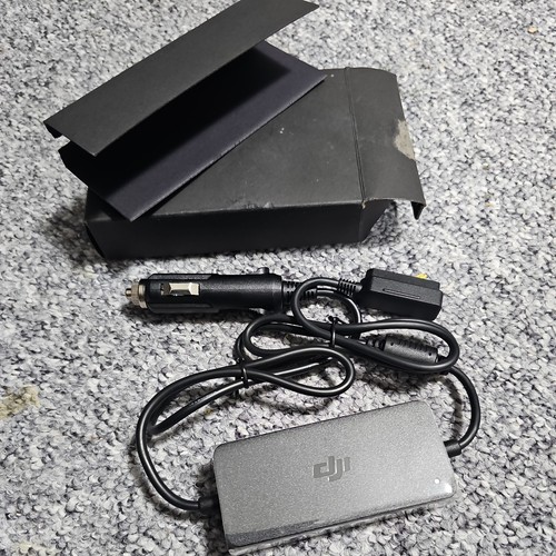Genuine new dji car charger - genuine,