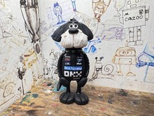 Dog in Lando Norris race suit