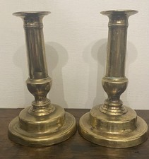 Pair Of Antique Brass Candle Sticks With Step Bases And Baluster Stems. 15cm