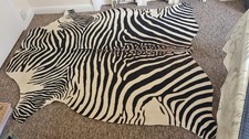 Zebra Pattern On Cow Hide Rug