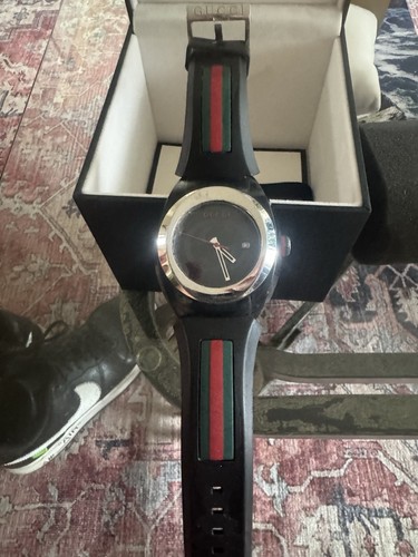 Unisex gently used gucci - unisex,
