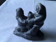 Canada Eskimo Inuit Art resin casting of Eskimo child + seal               [D]